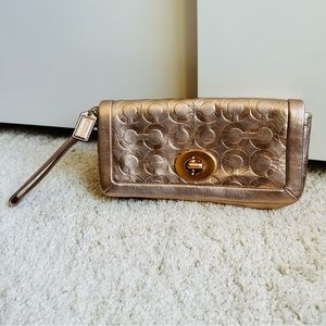 Coach clutch wristlet pouch rose gold